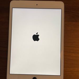 iPad Mini 2 Wi-Fi + AT&T cellular 32GB, white. With cable and power block